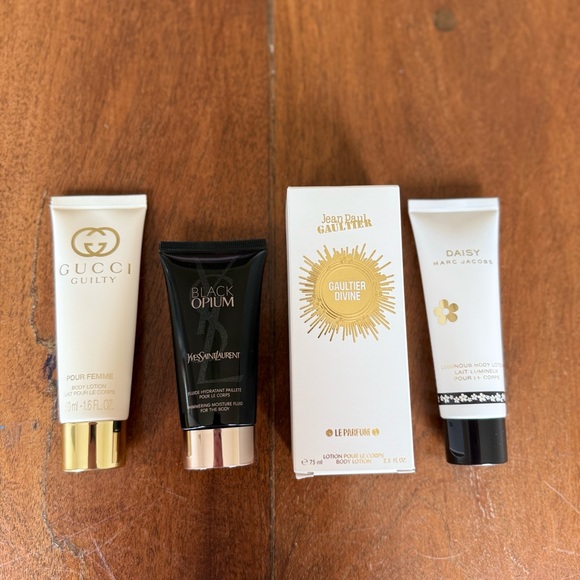 4 new lotion tube set *includes Gucci, Black Optum, Jean Paul and Daisy* - Picture 1 of 3